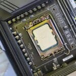 Close-up of a CPU securely mounted on a high-performance motherboard in a computer build.