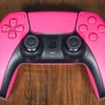 a pink video game controller