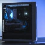 a computer with a blue light