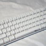 white computer keyboard on white textile