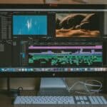 black iMac, Apple Magic Keyboard, and Apple Magic Mouse