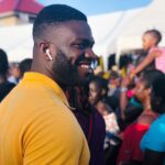 man in yellow shirt