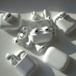 a group of apple airpods sitting on top of a table